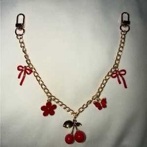 Red and Gold Bag Charm (BAG NOT INCLUDED)